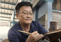 The Helping Hand helper transformed through work